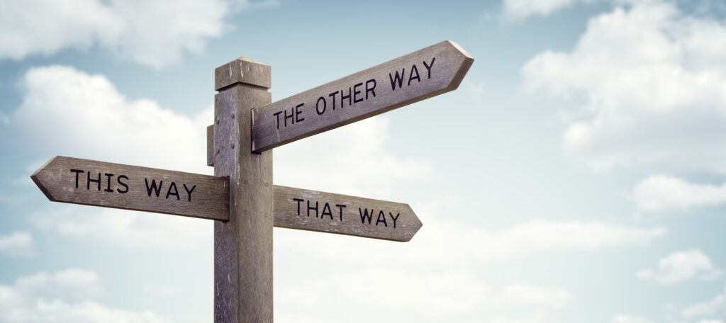 Confusing Signpost pointing to this way, that way and the other way