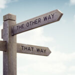 Confusing Signpost pointing to this way, that way and the other way